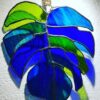 Monstera leaf suncatcher handmade in stained glass